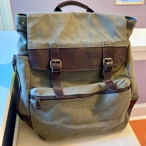 Large leather-accented canvas backpack